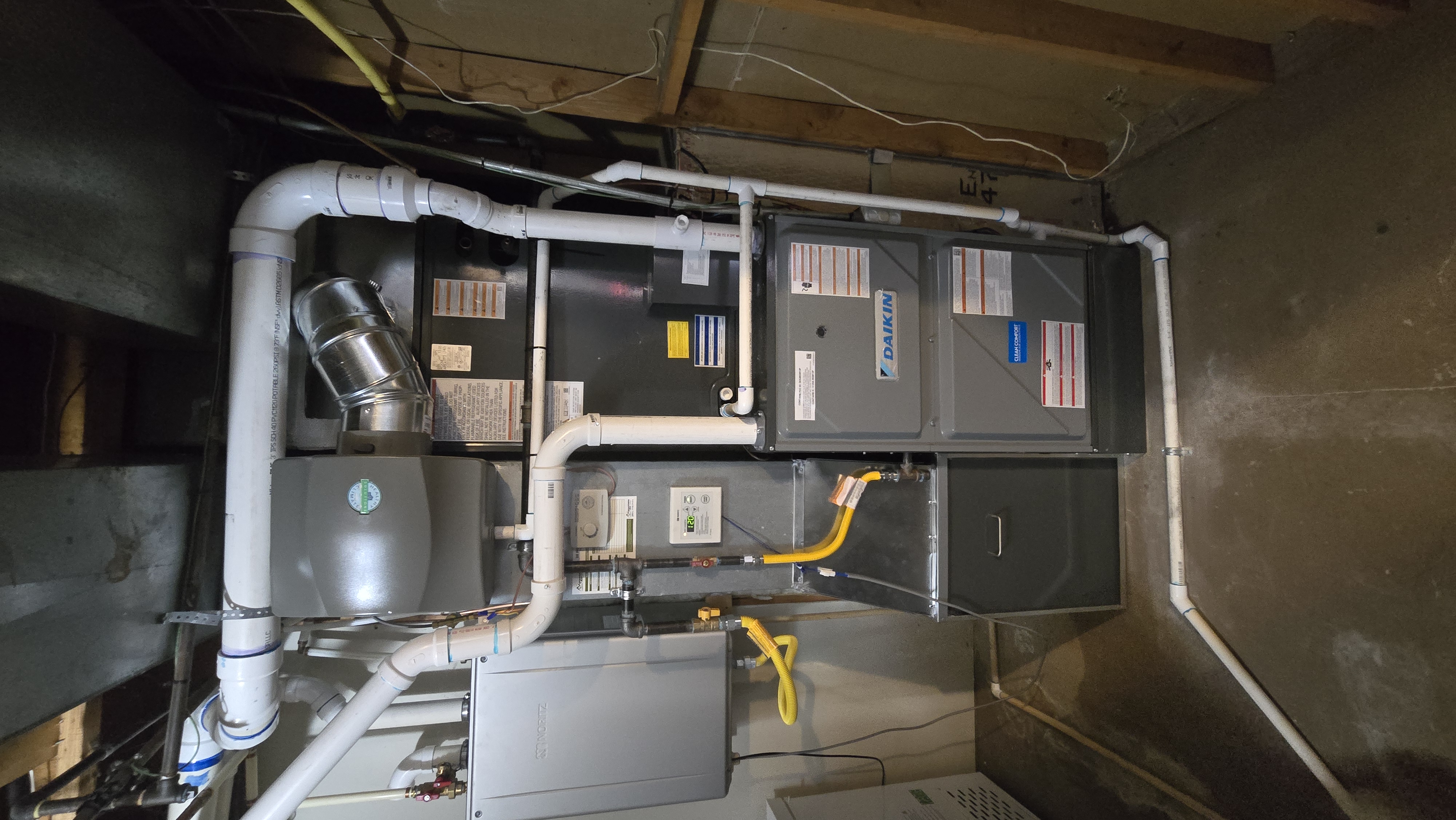 Daikin high-efficiency gas furnace and indoor air quality installation in utility closet